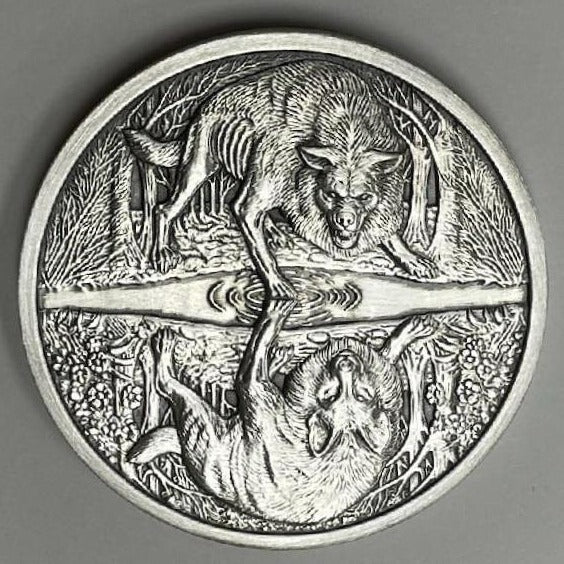 Two Wolves by Pheli Mint., 2oz .999 Fine Silver Antique Round