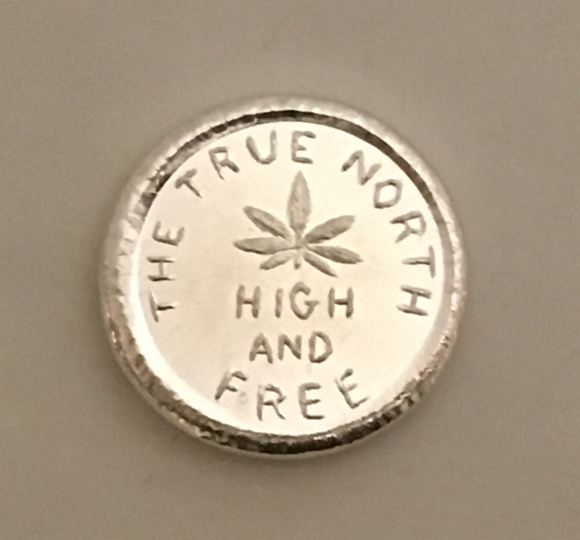 The True North High and Free round by Beaver Bullion 1oz Hand Poured .999 Silver